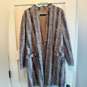 Trendy trench coat, made of polyester but looks like suede. Purchased at Anthro